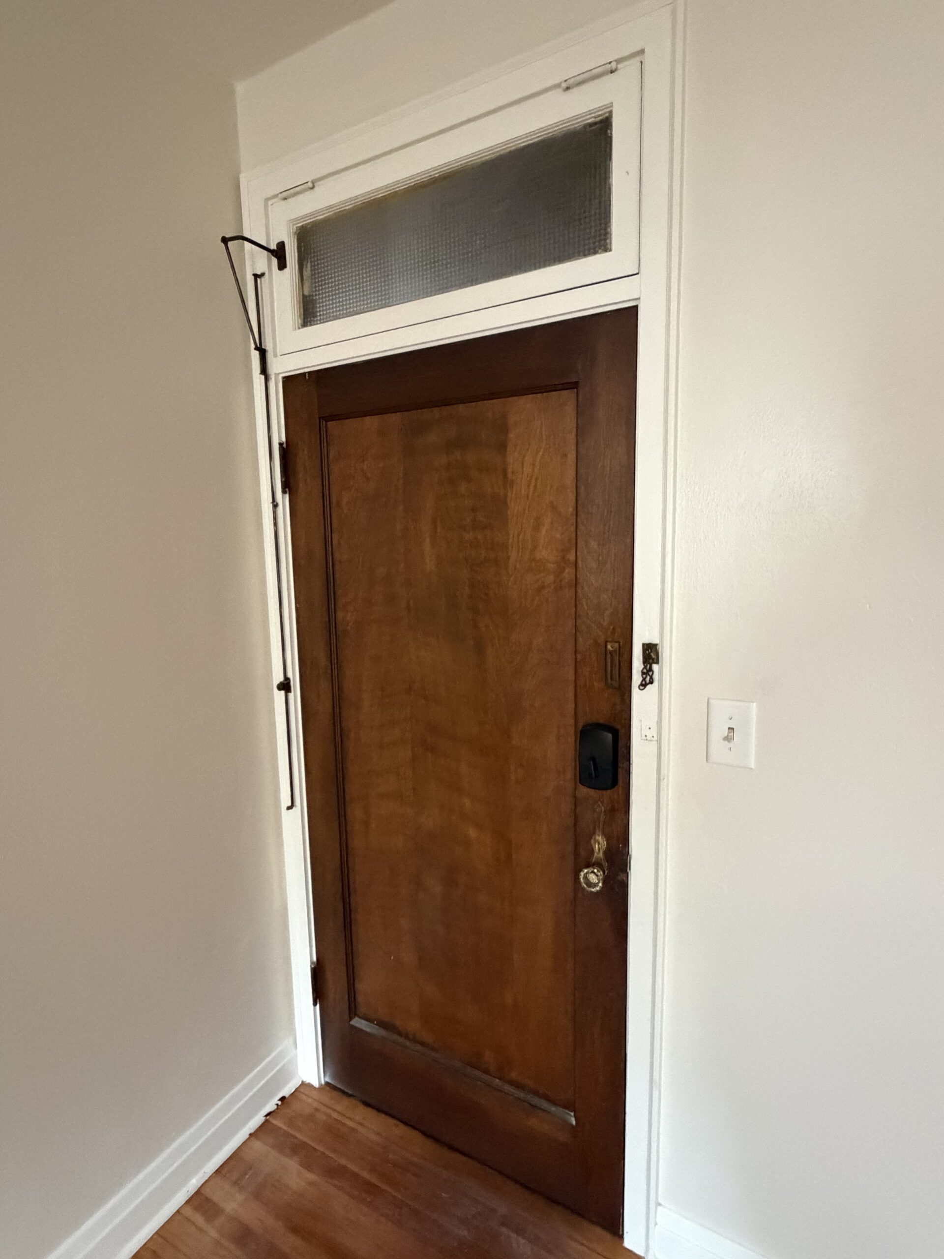 Entry Door Unit 8 - Studio Apartment with Full-Size Stove Kitchen, Private Bath & Two Closets at Holub Apartments in Northside Iowa City, IA