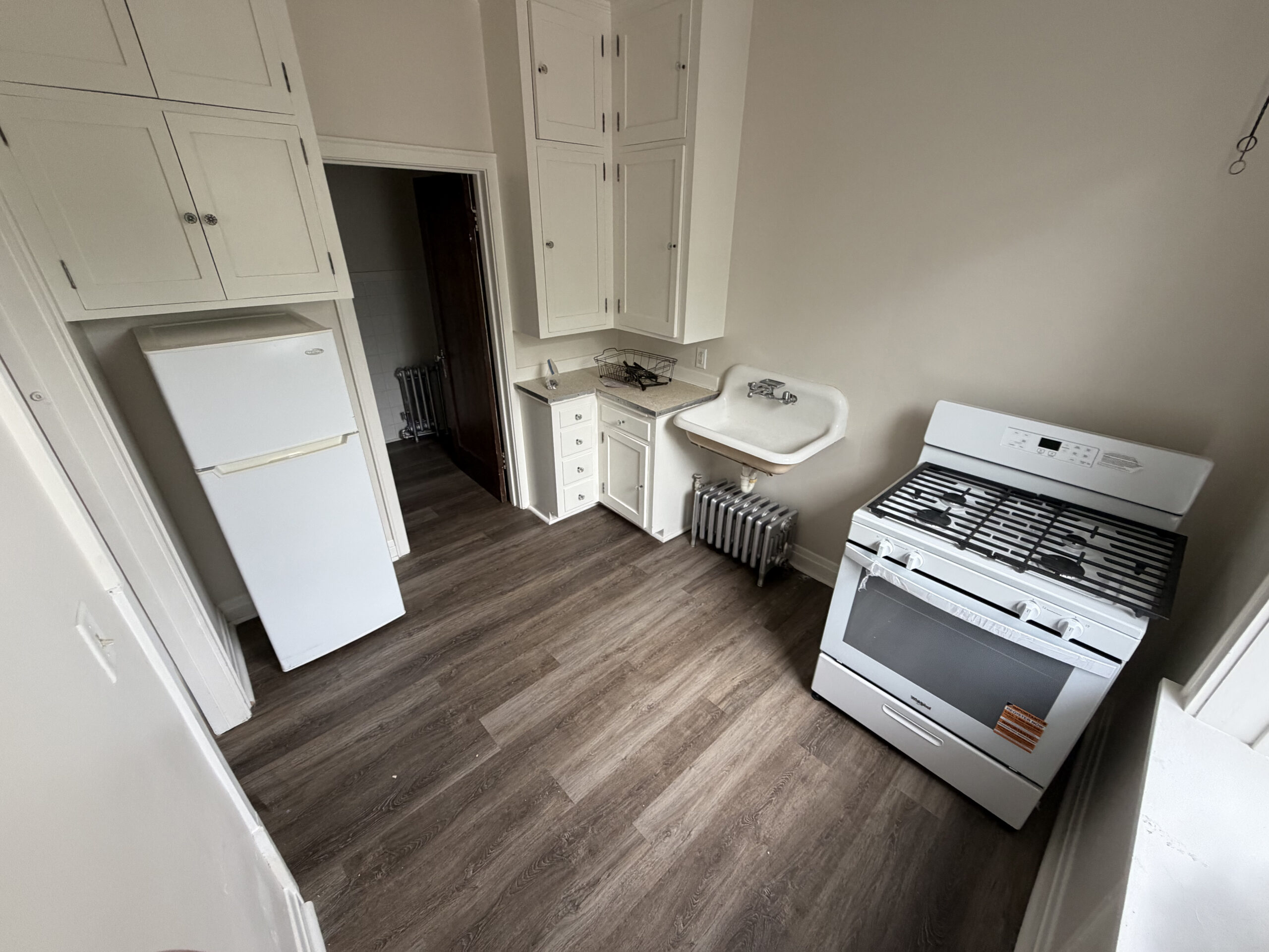 Kitchen Unit 8 - Studio Apartment with Full-Size Stove Kitchen, Private Bath & Two Closets - Holub Apartments in Northside Iowa City, IA