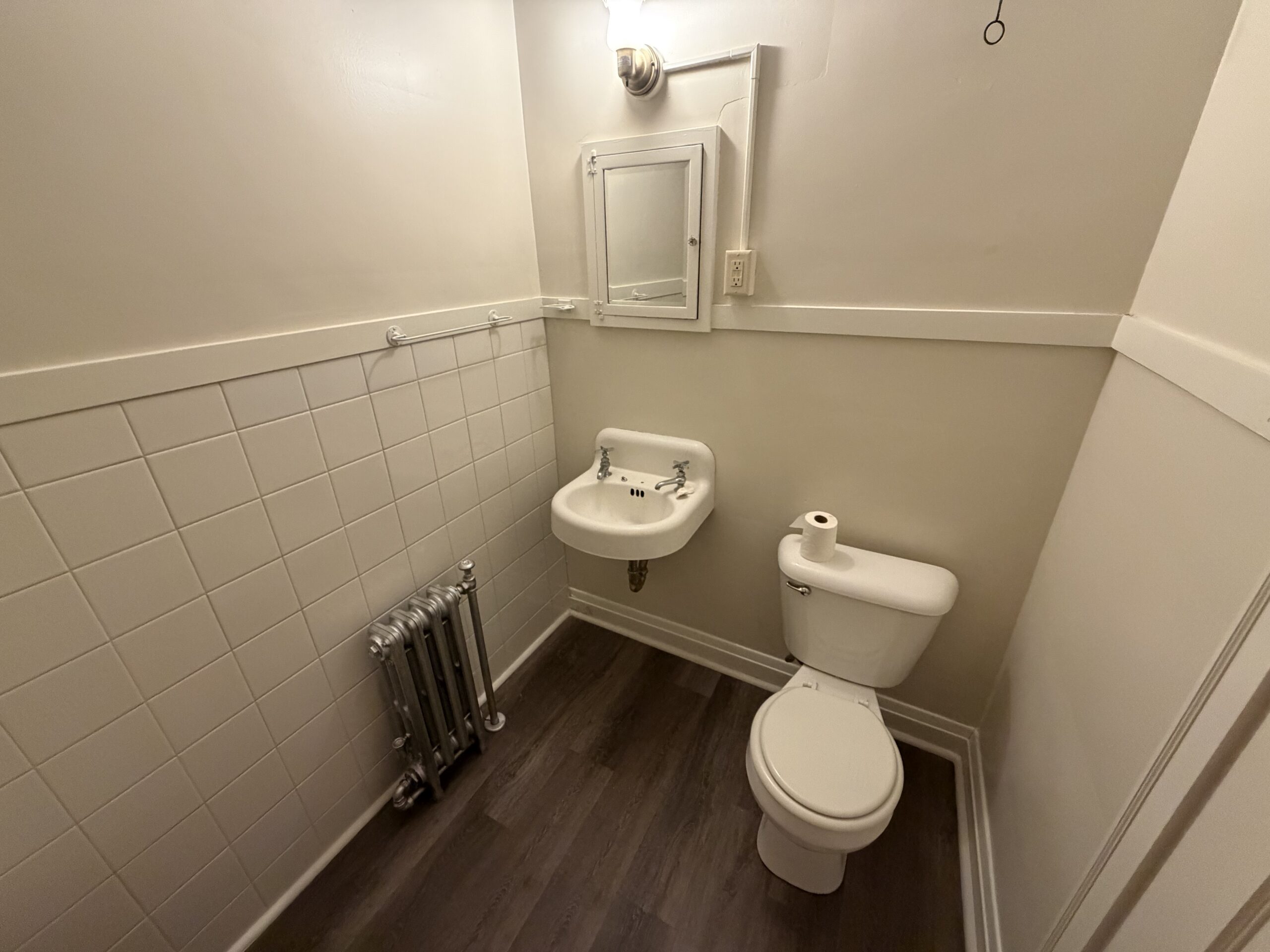Sink and Toilet Unit 8 - Studio Apartment with Full-Size Stove Kitchen, Private Bath & Two Closets at Holub Apartments in Northside Iowa City, IA