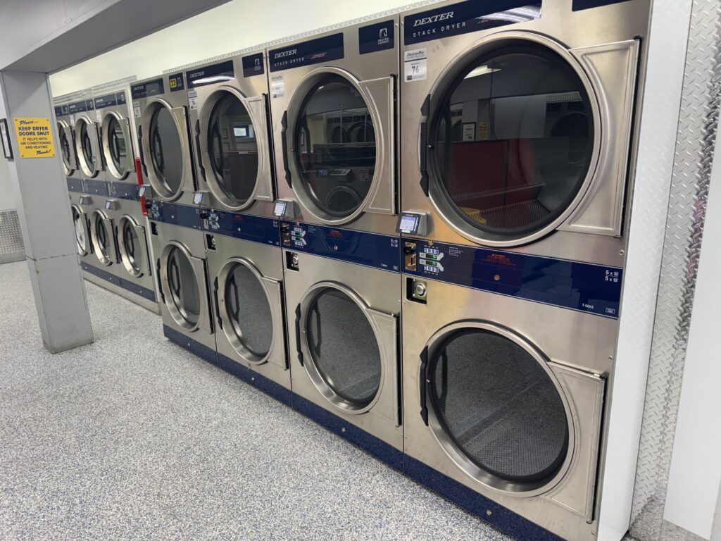 Dryers at Laundromania in Iowa City next to Holub