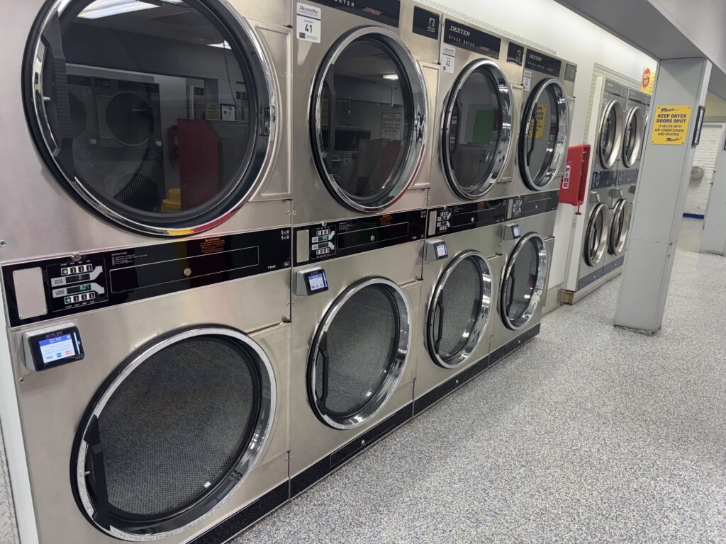 Multiple Dryers at Laundromania in Iowa City next to Holub